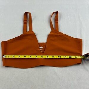 NWOT burnt orange parade sports bra, low cut, no wire